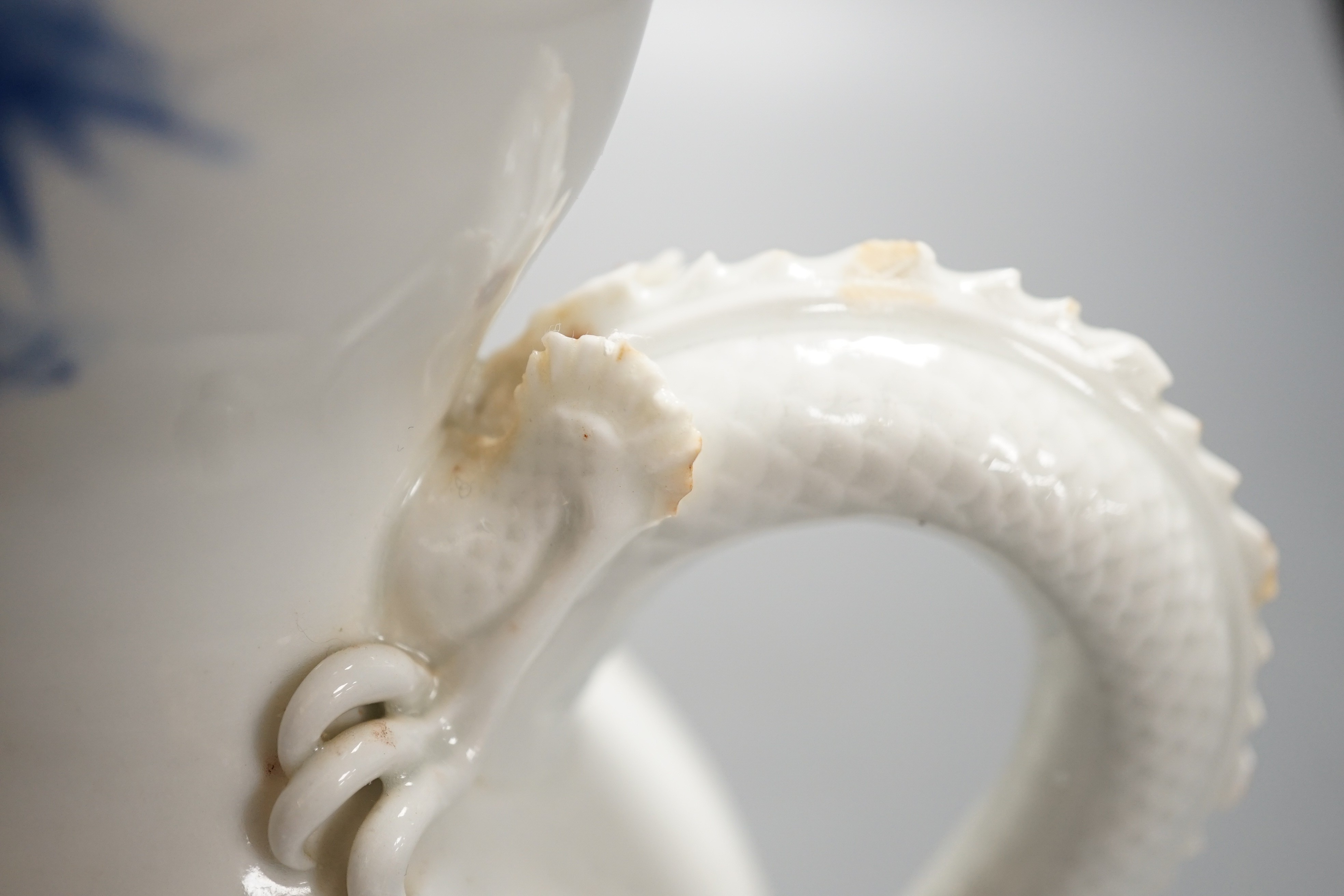 A Japanese Hirado blue and white 'dragon' wine pot, late 19th century, of double gourd shape, (losses) 19.5cm
